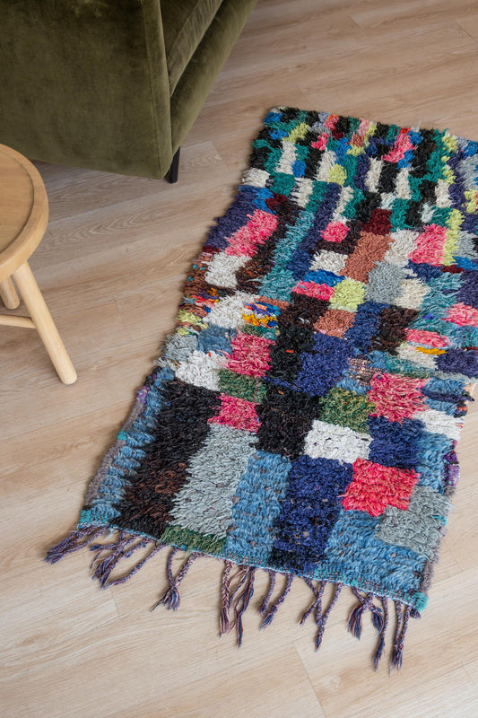 Vintage and vibrant Moroccan Boucherouite Accent Rug Runner: Handwoven Bohemian Floor Art for Eclectic Home Decor